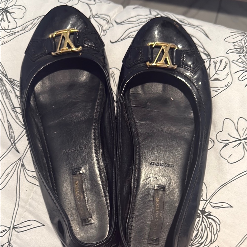 Louis Vuitton Black Flats with Gold Logo
